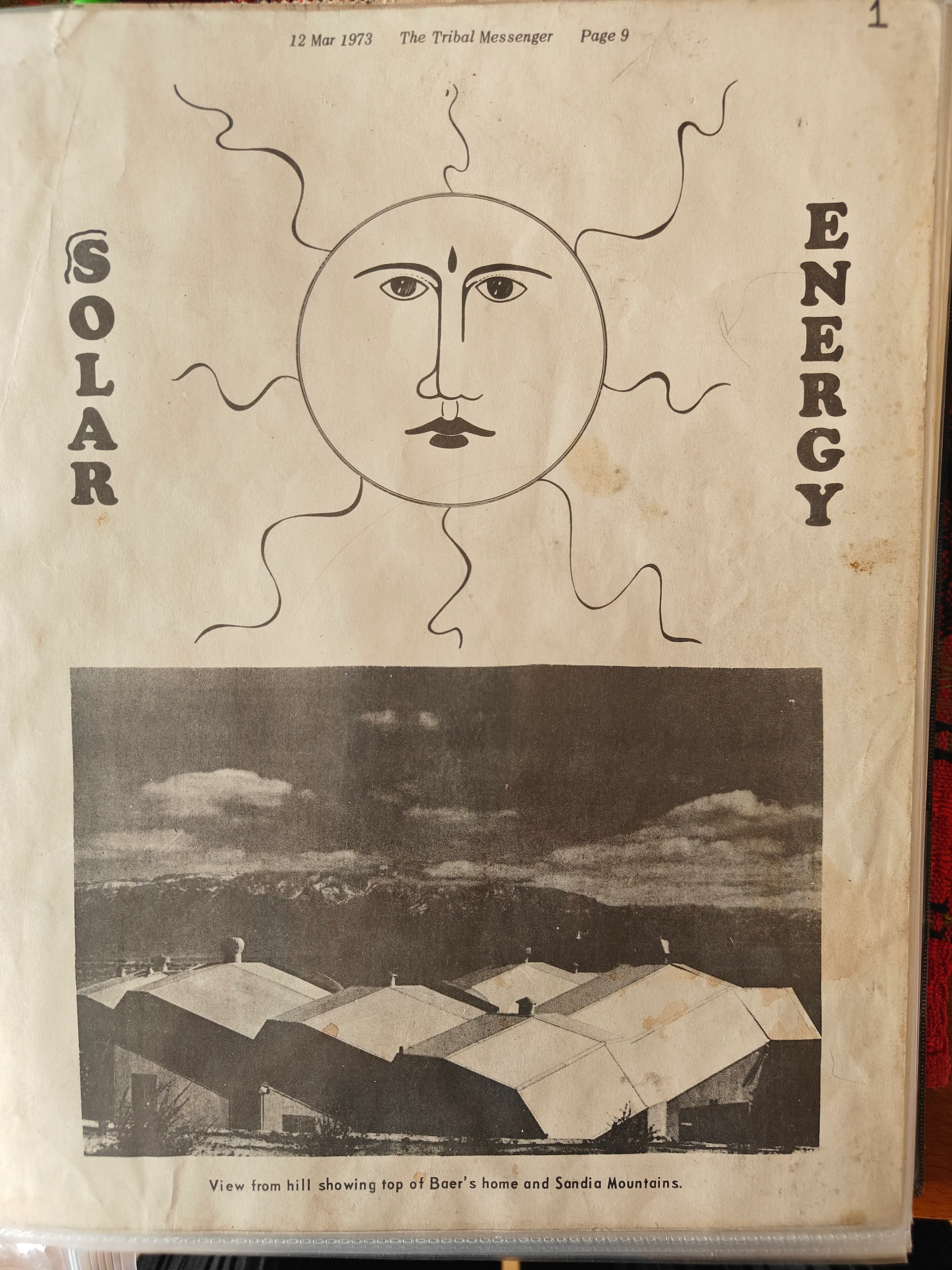 Cover of the Solar Energy insert in The Tribal Messenger, March 12 1973 — hand-drawn sun face above a photograph of the Baer house roofline and Sandia Mountains